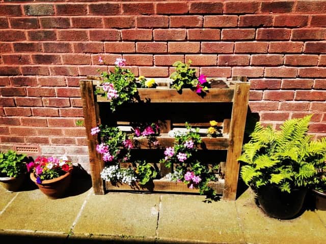 Bainnes School makes good use of recycling pallets in their sensory garden