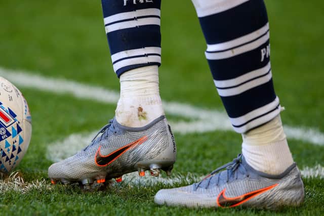 Signed boots are raising cash for the NHS