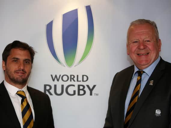 Bill Beaumont, right, with Agustin Pichot