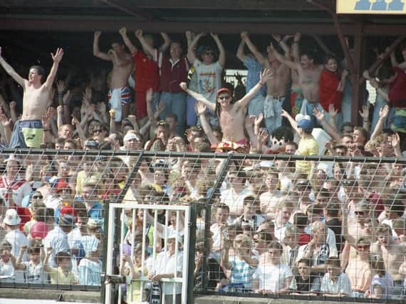 Preston North End fans pack the away end at Shrewsbury's Gay Meadow ground in May 1990