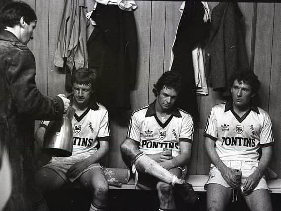 Preston North End players Graham Bell, Steve Elliott and Don O'Riordan in the Baseball Ground dressing room after PNE were relegated on May 6, 1981