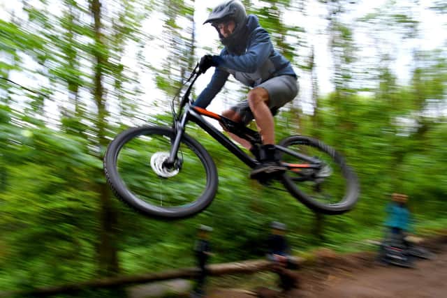 A young rider in action in Carr Wood