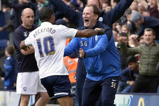 Jermaine Beckford celebrates with Simon Grayson after scoring his long range goal against Chesterfield in the play-offs in May 2015