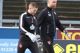 Morecambe goalkeeper coach Barry Roche, right, with Mark Halstead