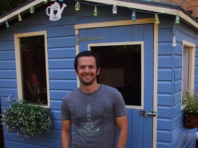 Mark Lowery pictured by his writing shed