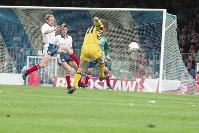 Preston striker Mark Leonard has a shot in the game at Bolton in May 1993
