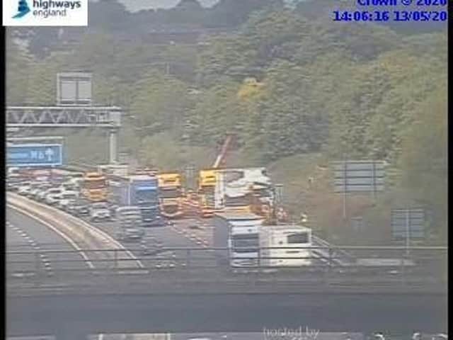 The crash involved two lorries near Sandbach Services, with one of the wagon's plunging into the embankment