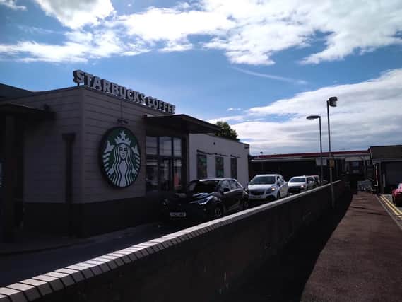 Cars were queued up at the recently re-opened Starbucks drive-through at Preston's Deepdale Retail Park.
