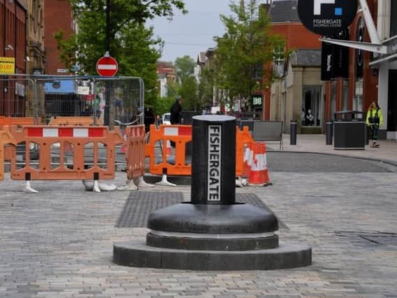 The first of six new-look bollards is back in place.