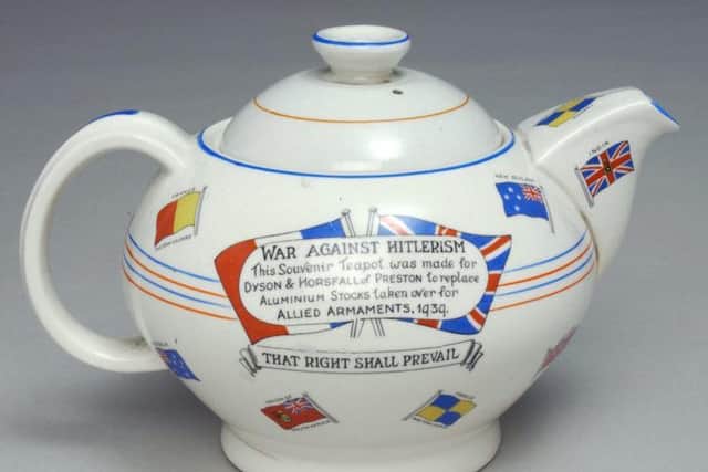 Patriotic teapot made for Dyson and Horsfall, a mail-order company in Preston painted with the slogan War against Hitlerism