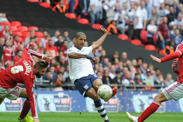 Jermaine Beckford curls home PNE's third goal against Swindon at Wembley
