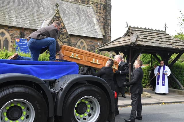 Ethel's coffin is gently lifted off Craig's truck
