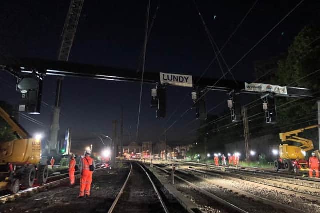 A gantry is being replaced at the station Credit:  Network Rail