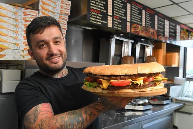 Yunus Sevinik pictured with his 14 inch challenge burger (Photo: Neil Cross)