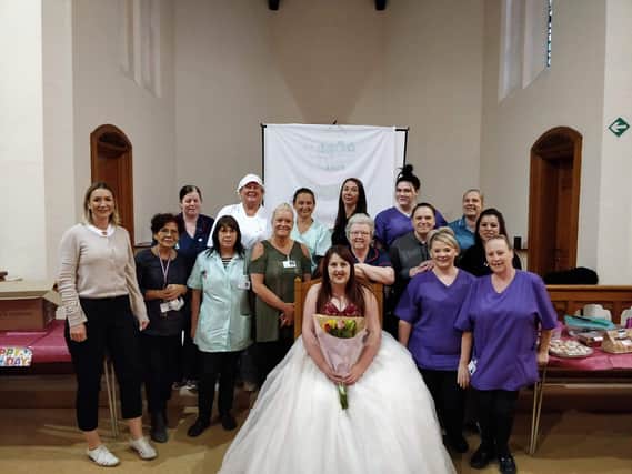 The "family photo" - Rachel poses with colleagues from the Springfield Manor Gardens care home