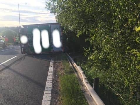 The overturned lorry on the M61 junction 6 sliproad