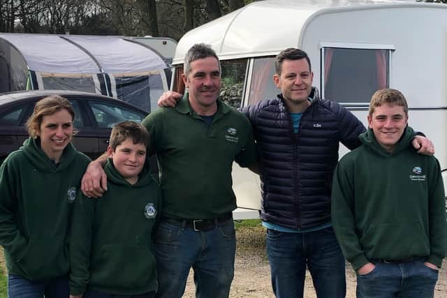 Amy Burrow (left), husband James (centre) and their sons Ollie and Eddie, with TV presenter Matt Baker.