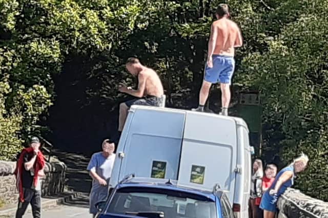 People were caught jumping off a bridge and into the water at Yarrow reservoir in Rivington. (Credit: United Utilities)