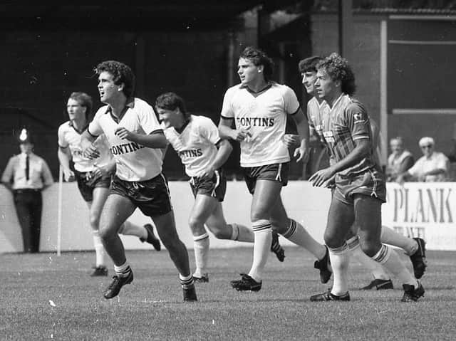 Andy McAteer leads Preston North End's push up field against AFC Bournemouth at Dean Court in August 1983