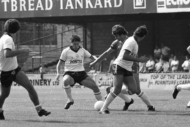 PNE midfielder Paul Lodge puts in a tackle against Bournemouth
