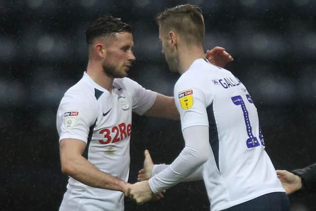 Preston midfielder Alan Browne is replaced by Paul Gallagher during a game this season