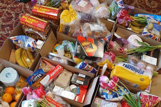 Families suffering financially through the pandemic are eligible for a food parcel delivery