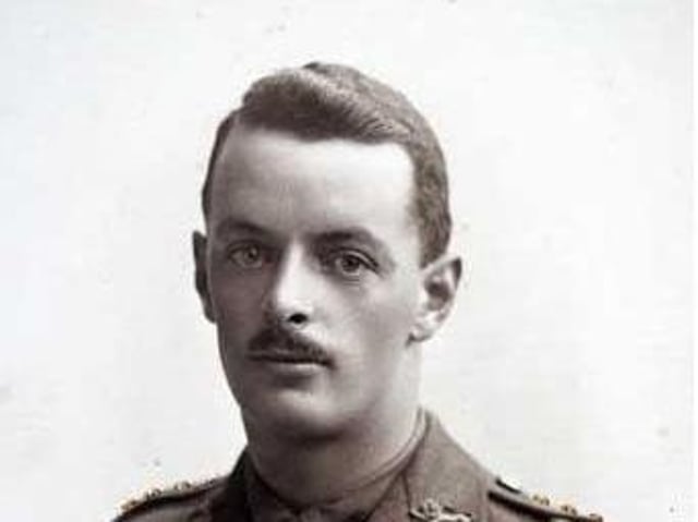 Captain Albert Ellwood. A coloured photograph produced after his death, with the medal ribbons for the Military Cross, 1914/15 Star, British War and Allied Victory Medals, painted on. Accession Number: KO3053/01. Picture courtesy of the King's Own Royal Border Regiment Museum.