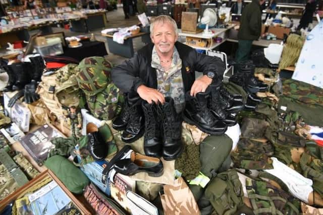 John Alty was glad to get back behind his Army surplus stall after two-and-a-half months.