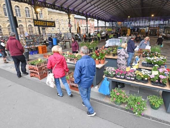 Customers welcome back Preston's outdoor market after a 10-week closure.
