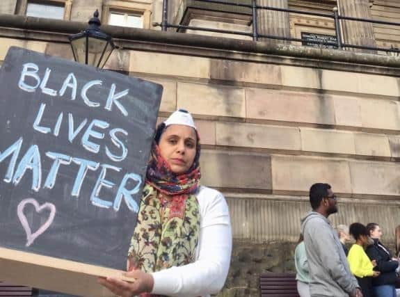 NHS nurse, Takhsin Akhtar, joined the protest to raise awareness of inequality in the justice system and healthcare. Photo: Pav Akhtar