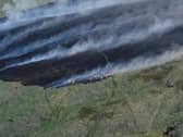 The wildfire which has decimated acres of moorland on Darwen Moor had been caused by a disposable BBQ