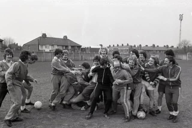 Manager Nobby Stiles, coaching staff and players take a break from training to celebrate their 1978 promotion
