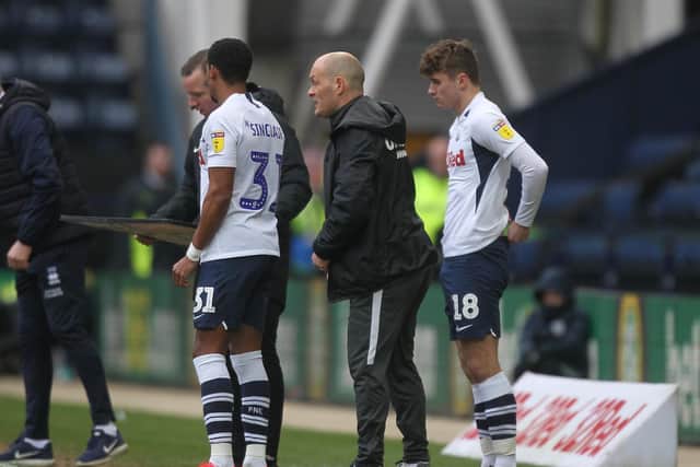 Scott Sinclair and Ryan Ledson get ready to come on as substitutes in PNE's last game against QPR in March