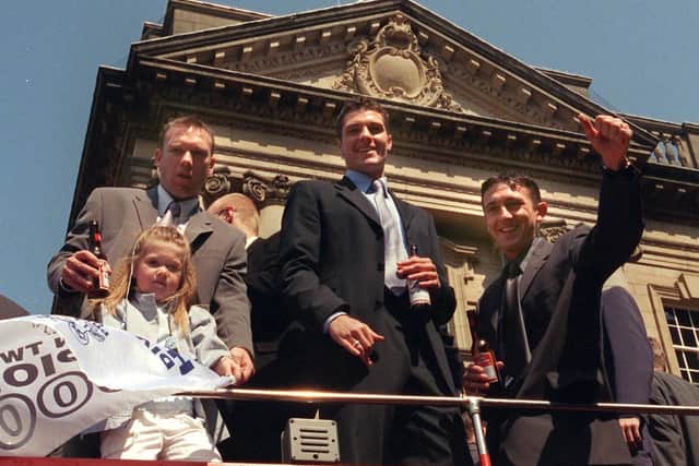 David Eyres (right) with Simon Davey and Michael Jackson on board the open top bus as PNE celebrate winning the Second Division title