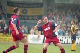 Preston skipper Ian Bryson celebrates scoring his second and PNE's fourth goal against Torquay at Plainmoor in October 1995