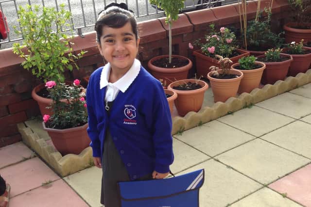 Aliyah Ahmed on her first day as one of the first reception class pupils at the new Blackpool Gateway Academy