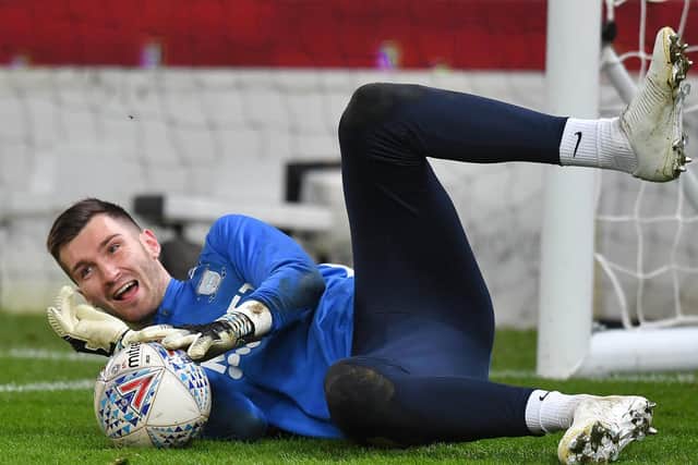 Preston keeper Mathew Hudson in the warm-up at Stoke in February