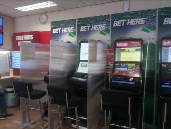 Screens between the gaming machines in Labrokes in Chorley