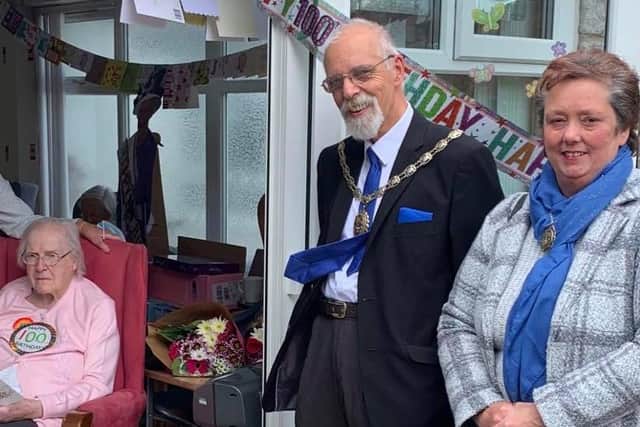 Jenny Hesketh celebrating her 100th birthday with Penwortham Mayorand Mayoress Geoff and Helen Crewe.
