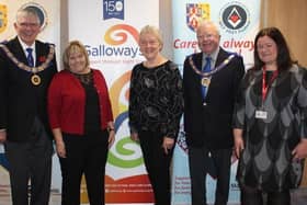 Leader of West Lancashire Freemasons Tony Harrison with partially sighted service users Linda McCann, from Preston, and Laurel Devey from Southport, and Nicola Hanna, head of income generation at Galloways. The meeting took place before the
lockdown was announced.