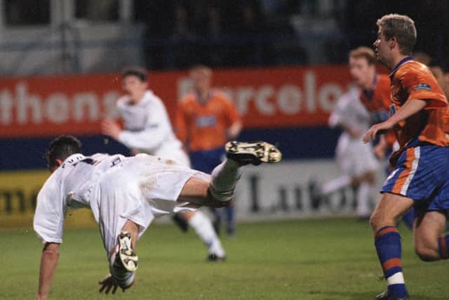 David Eyres scores with a diving header at Luton