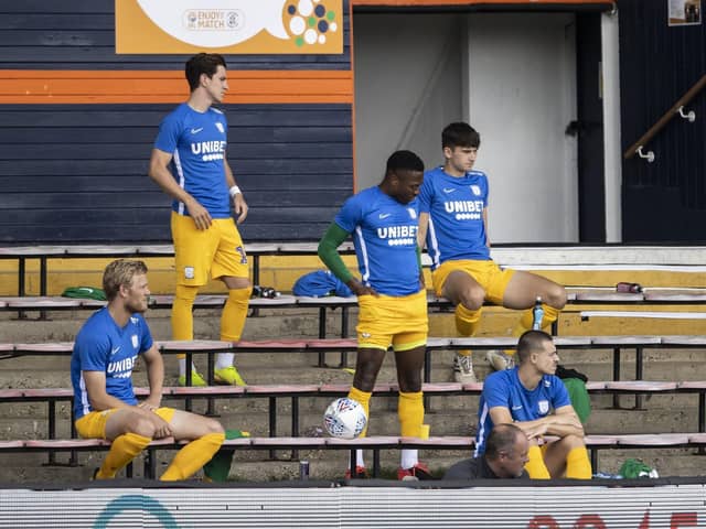 Preston North End's substitutes on the socially distanced bench at Luton