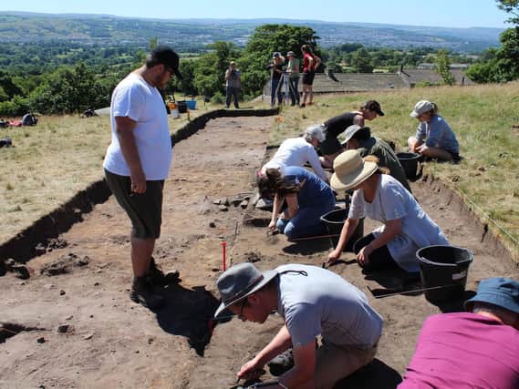 Volunteers and archaeology students pictured working on a previous archaeology project