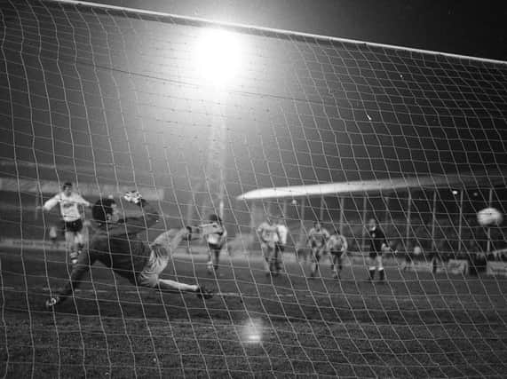 Gary Brazil scores for Preston from the penalty spot against Cambridge under the new Deepdale floodlights in March 1986