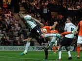 Preston's Tom Clarke scores against Blackpool at Deepdale in August 2013