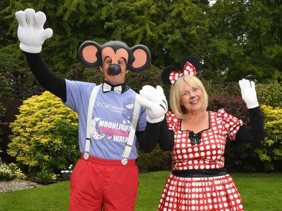John and Sue Smith have been raising money for St Catherine's Hospice as Mickey and Minne Mouse.