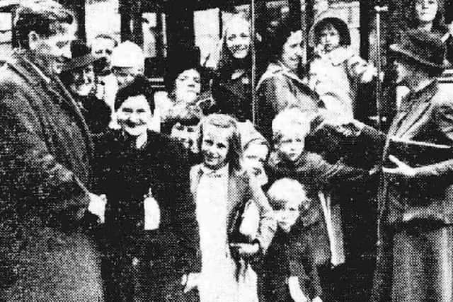 Evacuees at Preston Railway Station heading back to London