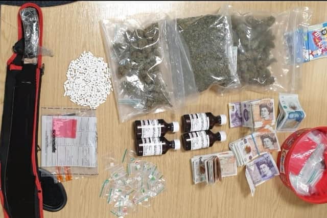 Drugs, cash and a machete were seized by officers patrolling in Deepdale last night (June 24). Pic: Lancashire Police