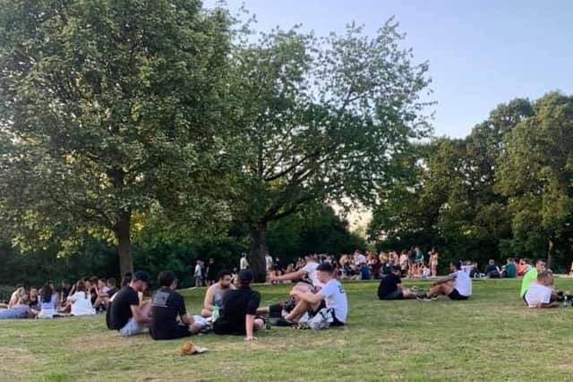 Crowds gathered in a park near the Pear Tree pub in Penwortham yesterday evening