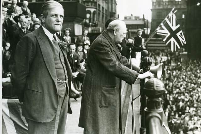 Prime Minister Winston Churchill addresses a crowd gathered on Prestons Flag Market from the steps of the Harris Library on June 27, 1945
